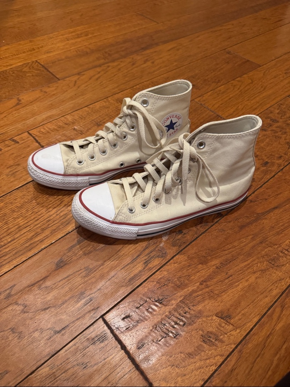 Converse High Top Sneakers in Cream with Red Stripe